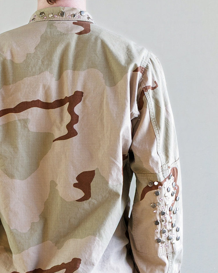 Austin Studded Twill BDU Unisex Jacket - Desert back view showcasing camo pattern and metal stud detailing.