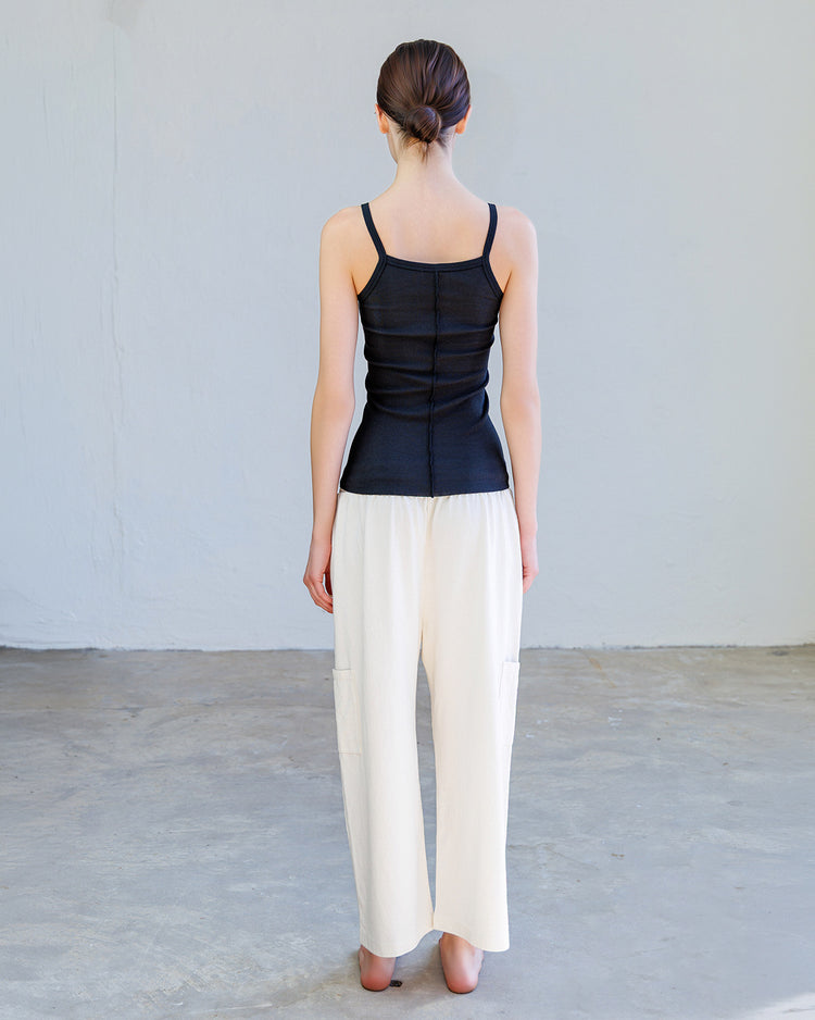 Nova Heavy Jersey Lounge Pant - Drift worn with a fitted black top, showcasing a relaxed back view in an indoor setting.