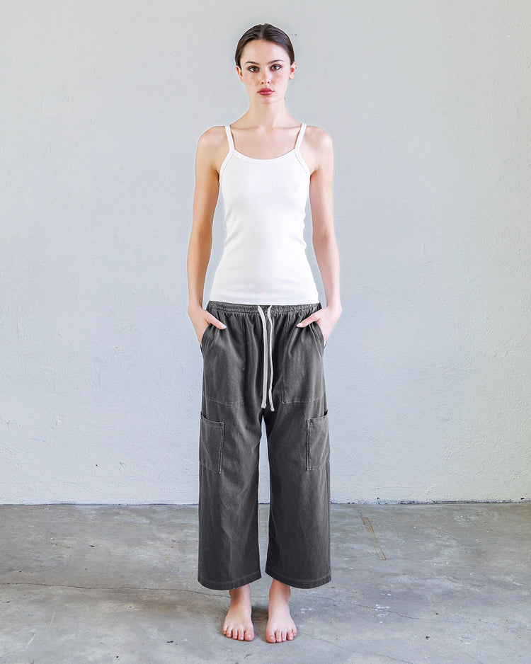 Model wearing the Kai Rib Cami Tank - Pearl with gray wide-leg pants on a neutral background.