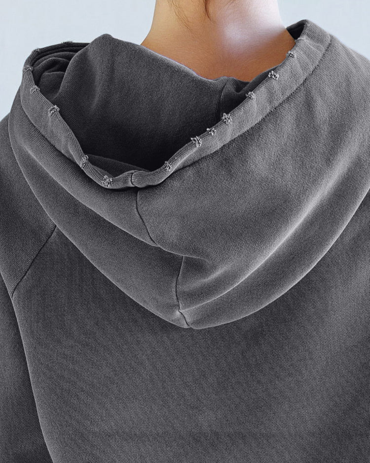 Lisse Loop Terry Hoodie - Aged Black showcasing the oversized hood and light distressing details.