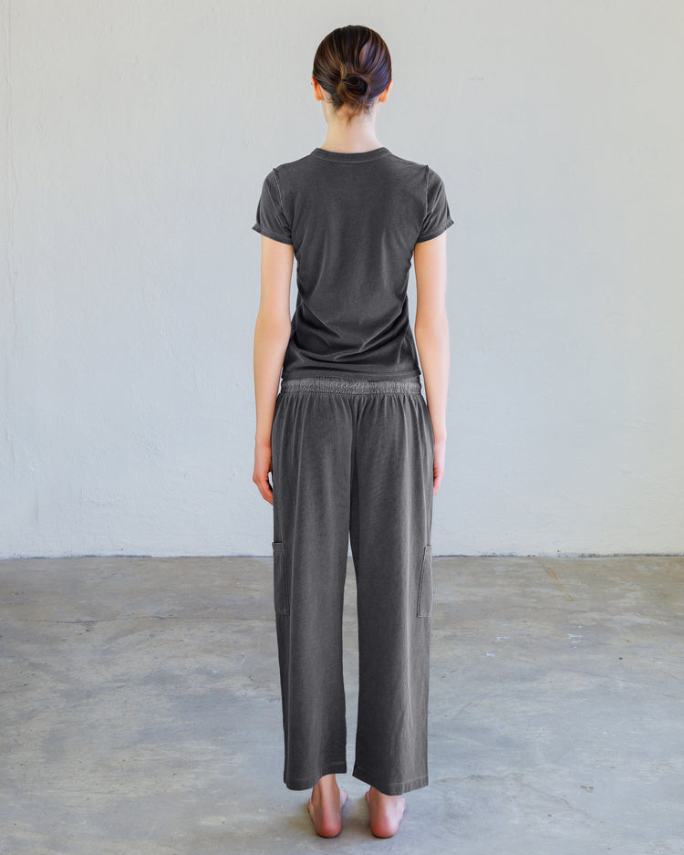 Alessi Fine Jersey Tee - Aged Black worn with matching pants, showcasing back view, featuring a soft and comfortable fit.