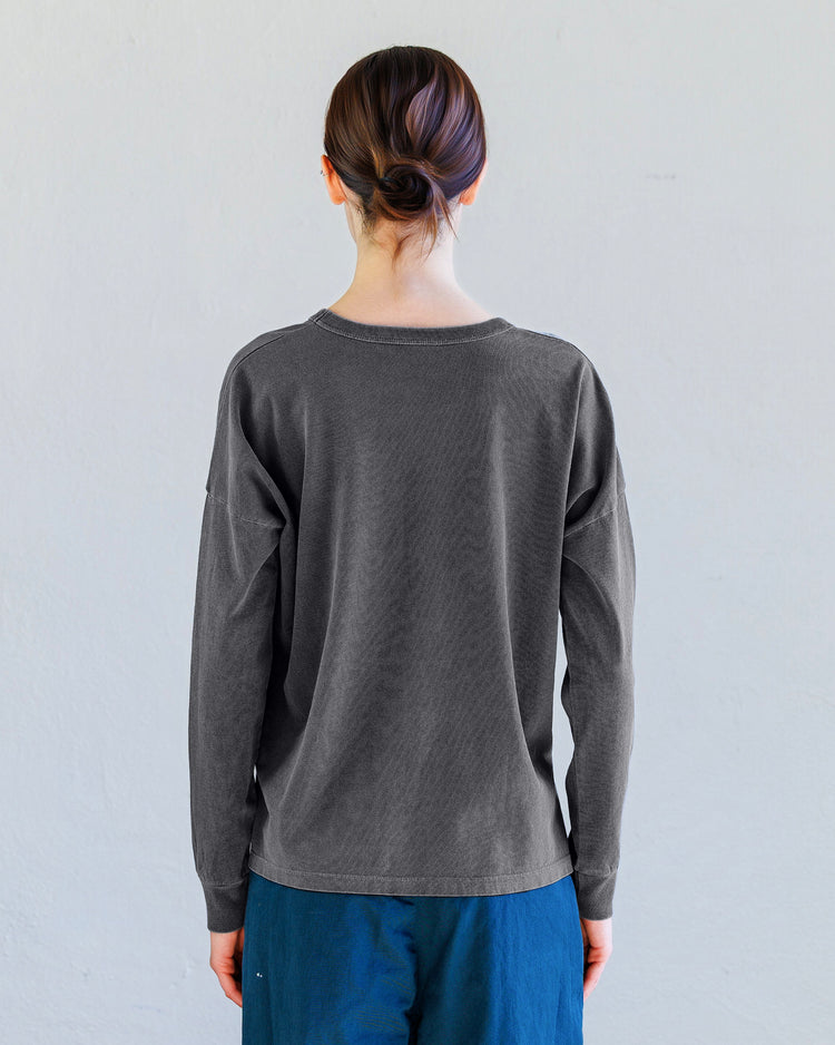 Theo Heavy Jersey Long Sleeve Tee - Aged Black shown from the back view, featuring a boxy fit and drop shoulder design.