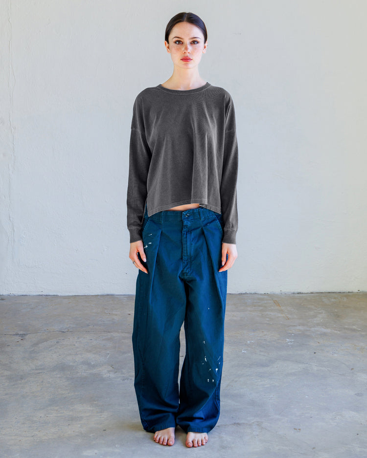 Theo Heavy Jersey Long Sleeve Tee - Aged Black worn with relaxed trousers in a minimalist setting.