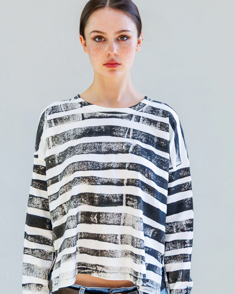 Theo Heavy Jersey Long Sleeve Tee - Black Fracture Stripe worn by model, featuring bold black and white fractured stripes.