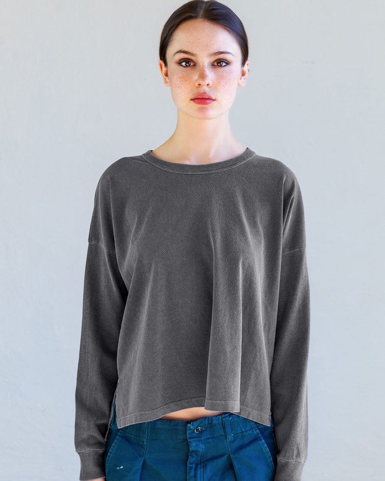 Model wearing the Theo Heavy Jersey Long Sleeve Tee - Aged Black, showcasing its relaxed fit and vintage-inspired design.