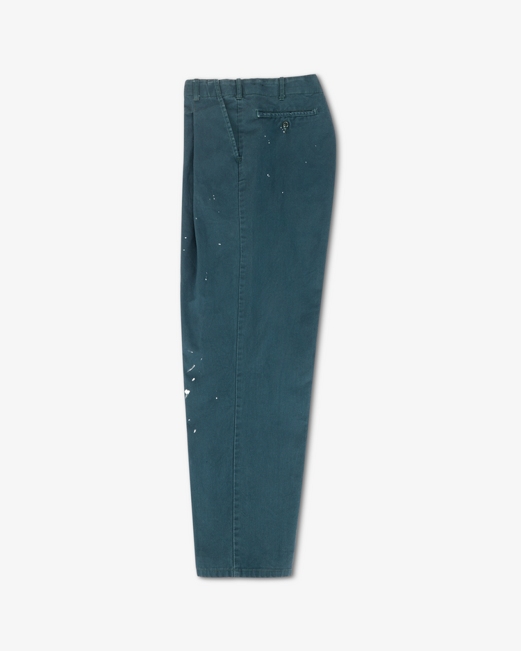Turner Pleated Twill Unisex Trouser - Teal Workshop side view showcasing relaxed fit and unique workshop treatment.