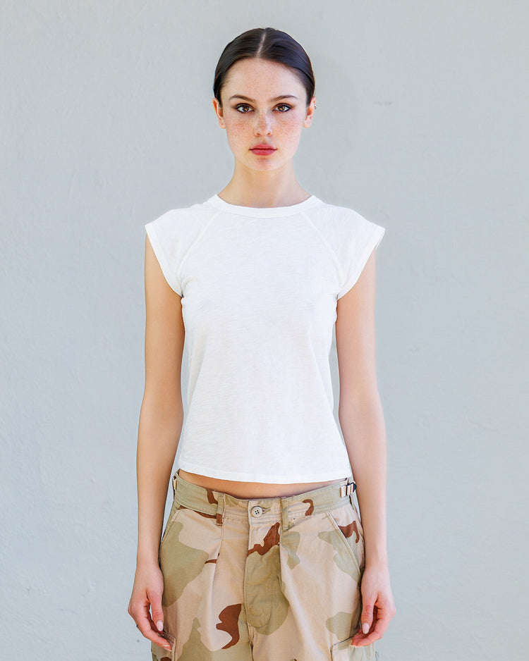 Chloe Slub Jersey Muscle Tee - Pearl worn by a model with raglan cap sleeves and a slim fit, showcasing soft fabric.