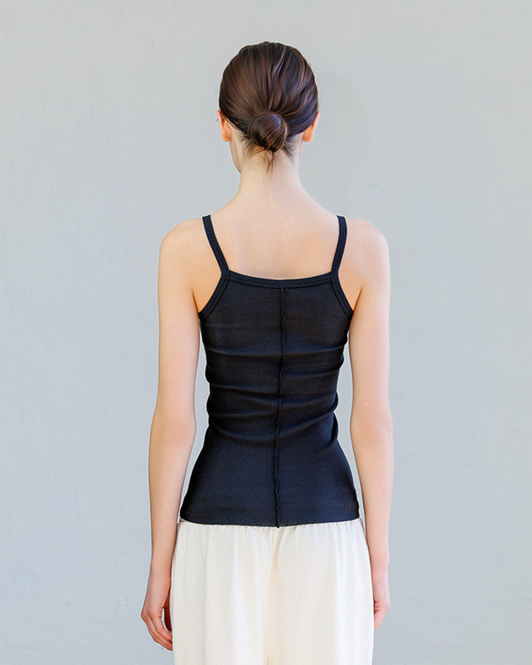Back view of the Kai Rib Cami Tank - Black showing slim-fit design and spaghetti straps.