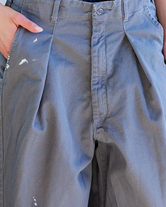 Turner Pleated Twill Unisex Trouser - Cement Workshop showcasing front pleats and relaxed fit in a gray fabric.